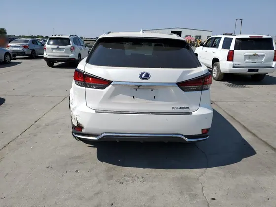2020 Lexus RX VIN 2T2JGMDA7LC055254 - photo 4 of 13
